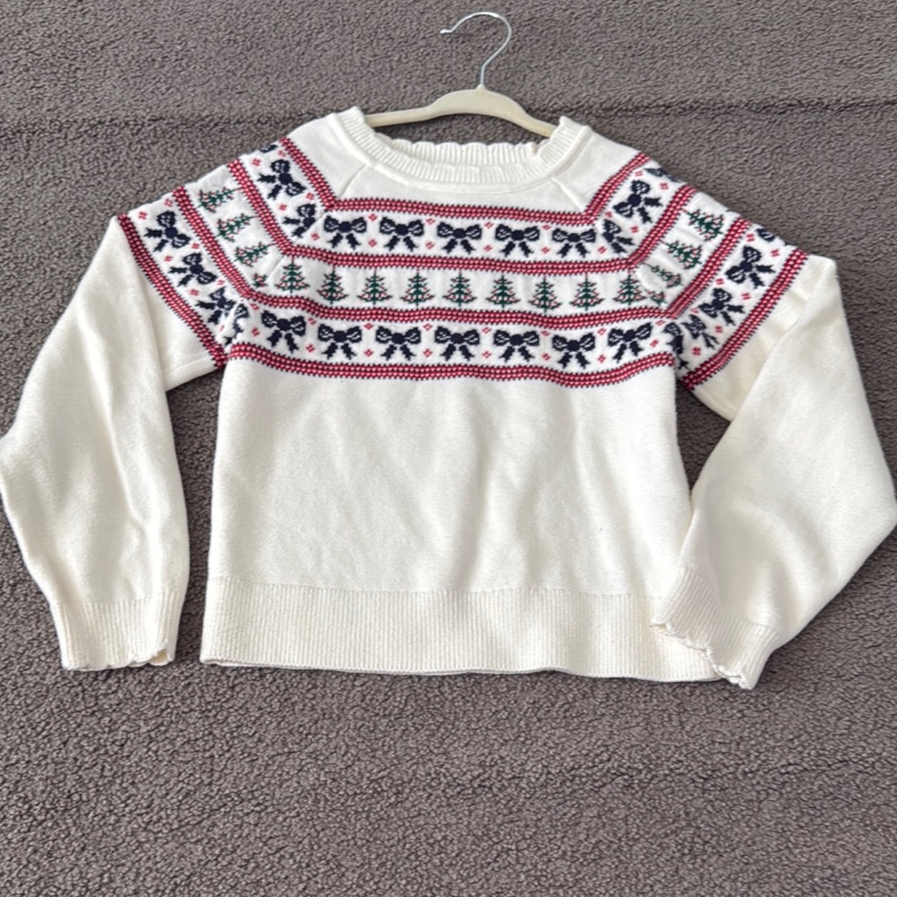Festive White Sweater with Red and Black Pattern
